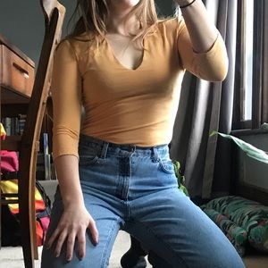 Orange cream v-neck top